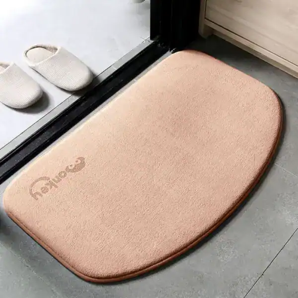 Ronde badmat taupe met antislip rand, geschikt als badkamermat of douchemat.