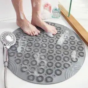 Ronde badkamermat met antislip textuur voor veilig staan in de douche.