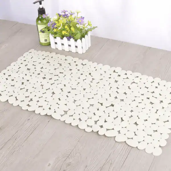 Wit rubber badmat antislip met ovaal patroon voor badkamer.